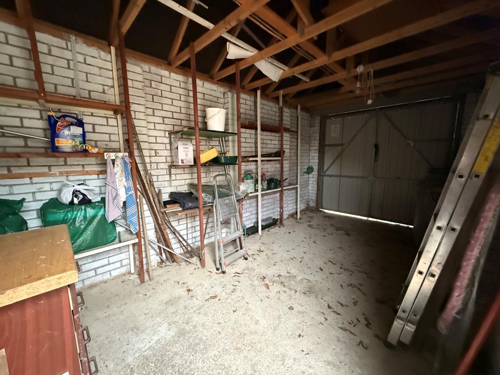 Lot: 102 - TWO-BEDROOM BUNGALOW IN NEED OF IMPROVEMENT - Garage with electric and shelving available